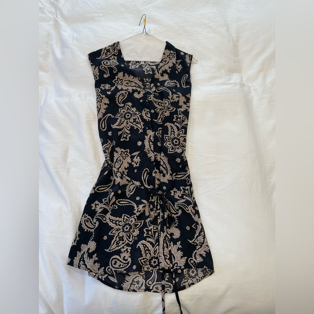 Perfect mini dress or classy swimsuit cover